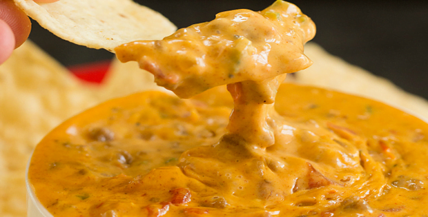 A Super Cheesy Crock Pot Spicy Beef Queso Dip