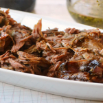 Slow Cooked Leg of Lamb With Mint, Rosemary And Garlic